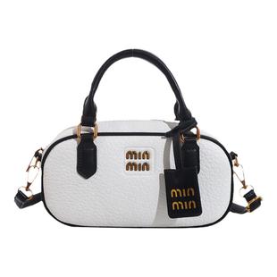 左杏保龄球包包女2025夏季新款手提包复古撞色枕头包单肩斜挎包潮