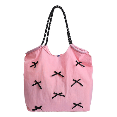 松弛感大容量尼龙布包包女2026新款轻便百搭通勤单肩斜挎包托特包