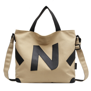 大容量帆布2025新款拉链款大学生装书袋通勤旅行大包斜挎单肩包