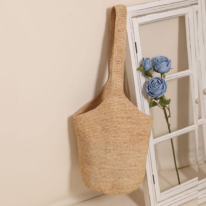 新品 拉菲草大容量单肩草编包新款水桶草包度假风沙滩包百搭女包