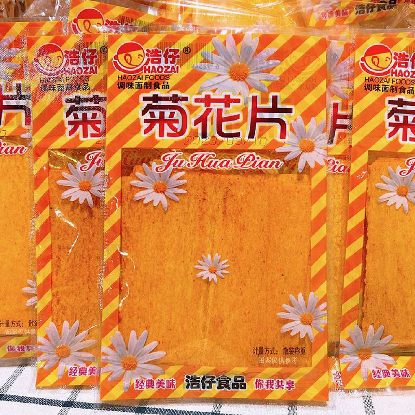 浩仔菊花片香辣片干辣条印度飞饼8090后怀旧儿童零食调味面制品