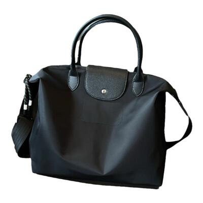 黑色高级感饺子包男女手提斜挎包