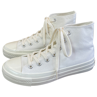 纯白色休闲风透气男女同款帆布鞋