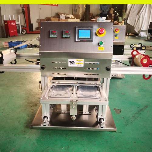 全自动幸包装心形八宝饭封口机方形圆碗封膜机餐盒封碗机