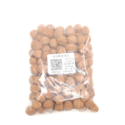 秦岭近正圆金鱼肚散籽龙纹桃核