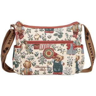 丹尼熊单肩斜挎包女包新款小众简约休闲编织轻便布包通勤5825046