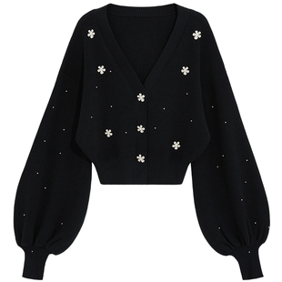 bebe2025秋季新款女士黑色含羊毛深V领灯笼袖针织开衫330601