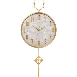 现代轻奢挂钟家用客厅高端贝壳装饰金属壁钟时尚静音表挂墙石英钟