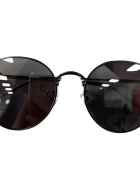 茶色墨镜女小脸ins街拍圆形