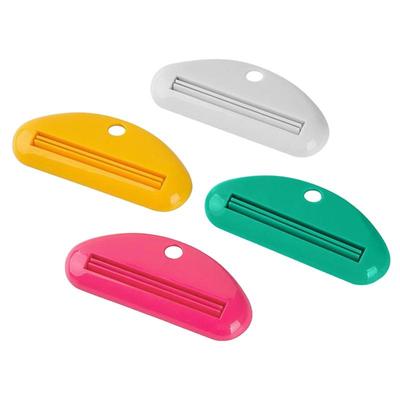 挤牙膏神器牙膏夹子洗面奶护手霜挤压器手动挤牙膏软管小样卷压器