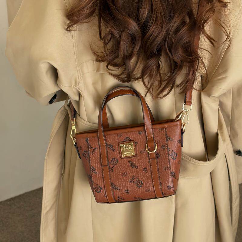 加菲猫家族菜篮子包包2025新款复古手提包时尚百搭通勤单肩斜挎包