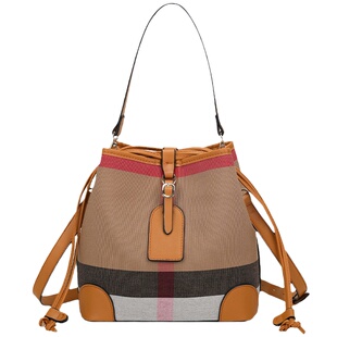 帆布包包女式2026新款潮高级感时尚真皮拉绳水桶包百搭单肩斜挎包