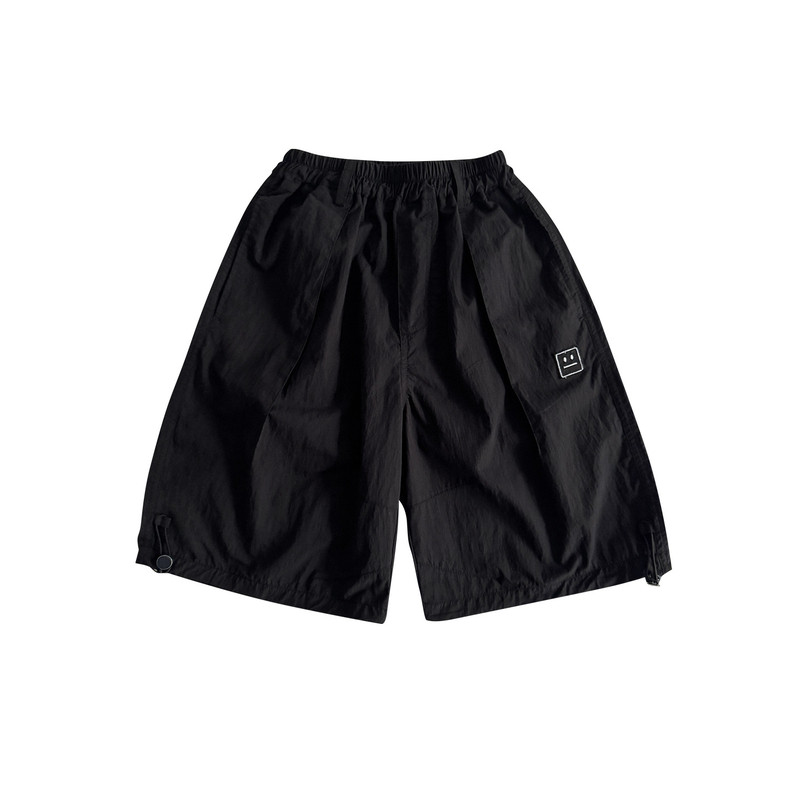 纯色纯棉黑白色笑脸贴标打杆短裤