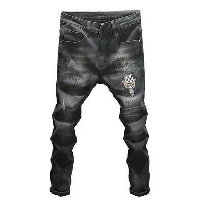 黑色水洗潮牌印花牛仔裤镶钻长裤