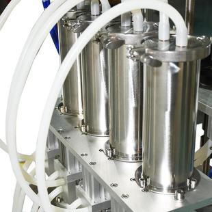 机 机负压真空香水瓶灌装 施耐克自动香水灌装 机四头真空灌装