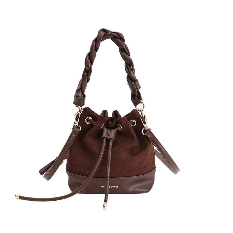 复古小众麻花手提水桶包女2025新款秋冬时尚通勤包休闲百搭斜挎包