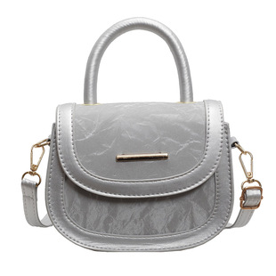 银色包包女2024新款时尚小众设计单肩斜挎包高级感女士手提马鞍包