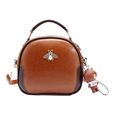 爆款手提小包包女春夏2025新款高级感百搭小众单肩斜挎真皮小圆包