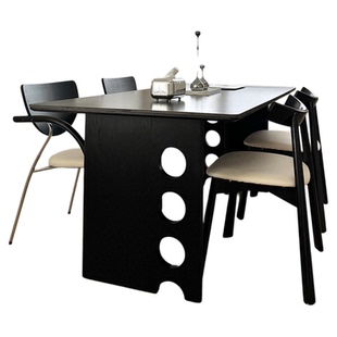 黑色实木餐桌长方形全托饭桌现代简约2025新款小户型哑光岩板餐桌