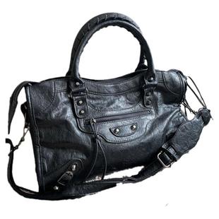 Damao studio辣妹新潮牛皮机车铆钉流苏大号皮包单肩斜挎手提女包