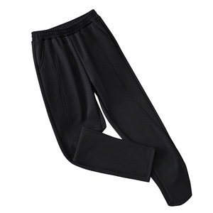 300特大码裤子女200斤胖mm冬季宽松显瘦加绒加厚休闲小脚哈伦长裤