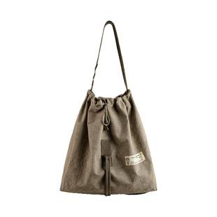 马登工装美式复古大容量扎染帆布伞兵包手提单肩斜挎水桶包袋男女