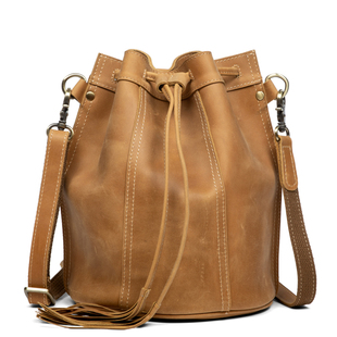 复古牛皮水桶包女真皮包包耐磨2023新款复古大容量单肩斜挎包抽绳