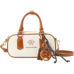 畹町面包坊手提枕头包女25年春季学院风斜挎包拼色单肩小保龄球包