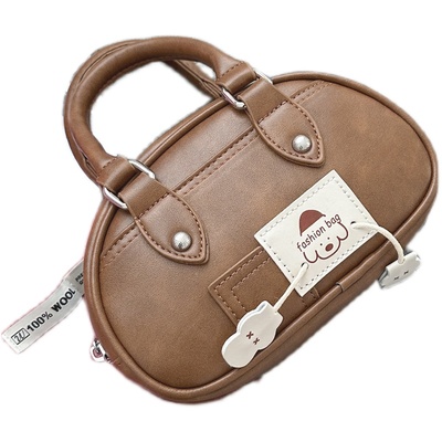 卡乐儿手提斜挎小复古保龄球包