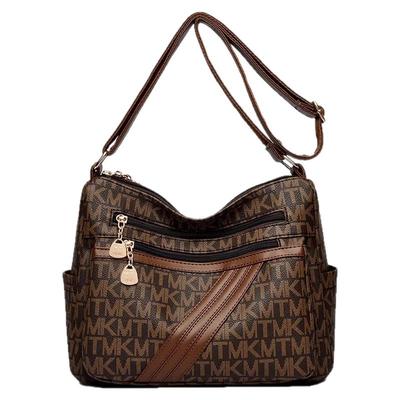 真皮女包2025新款大气中年妈妈包大容量旅行印花做生意单肩斜挎包