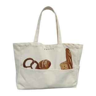 慵懒风面包印花帆布包男女大容量手提妈咪瑜伽运动通勤上课书包袋