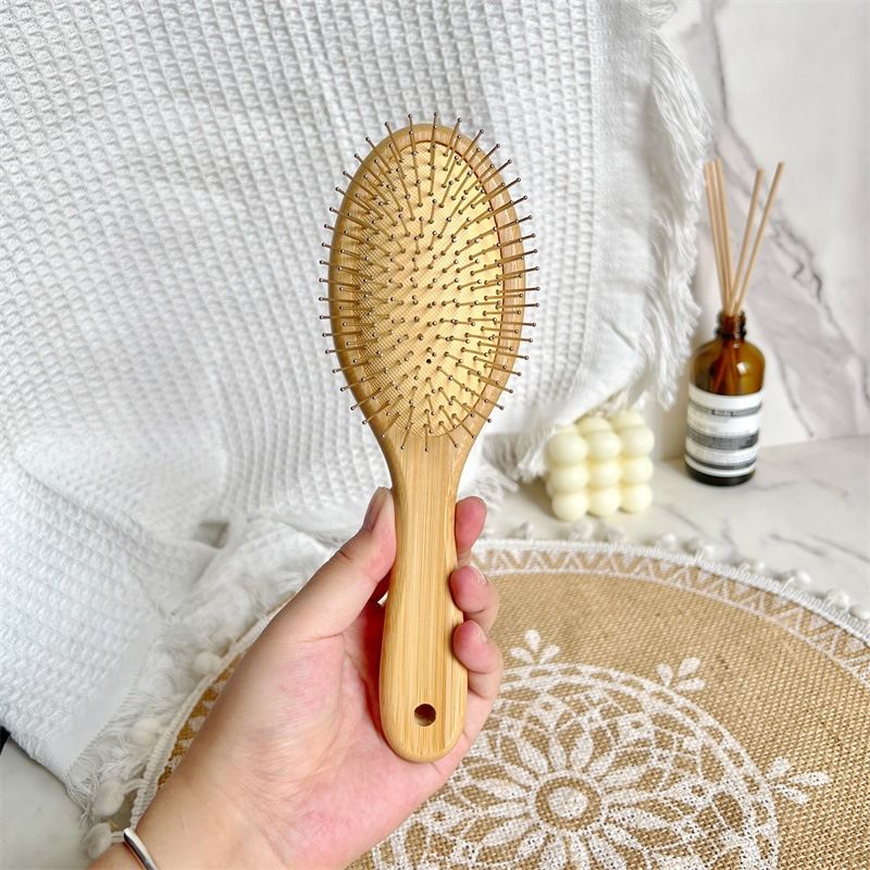 钢针气垫木梳子天然蓬松气囊按摩针梳圆头钢齿防静电养发神器女