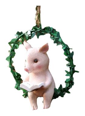 可爱吊环秋千上看书的小粉猪猪