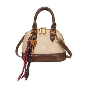 Clean Knоck今年流行贝壳小包包女2026新款轻奢小众高级感斜挎包