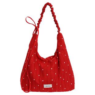 松弛感大容量包包女士2026新款休闲百搭斜挎包通勤单肩包轻便布包