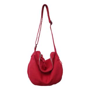 斜挎包包女款单肩包2025新款百搭学生上课大容量帆布邮差包饺子包