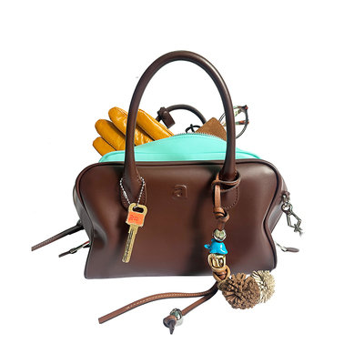 aaip撞色子母包斜挎波士顿包