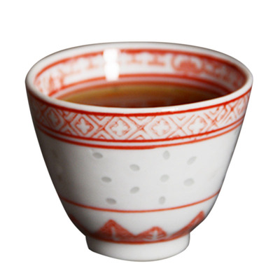 80年代泛红釉下玲珑金钟杯