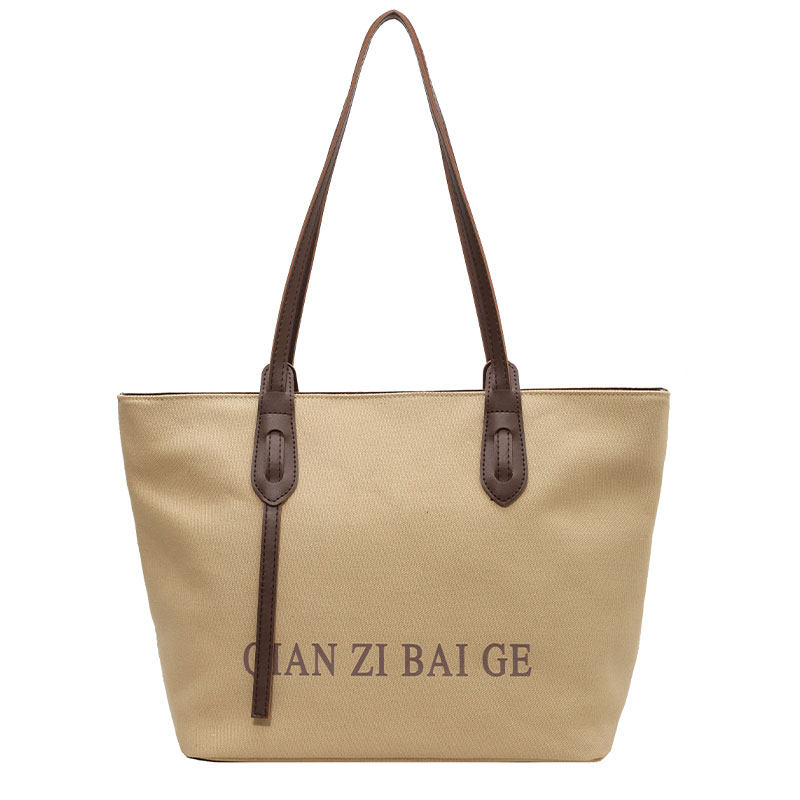 休闲大容量帆布包女2025新款简约小众通勤托特包大学生上课单肩包