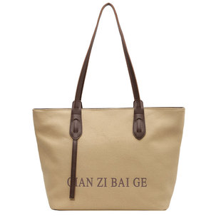 休闲大容量帆布包女2025新款简约小众通勤托特包大学生上课单肩包