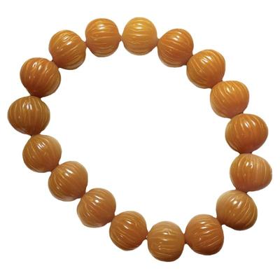 鸡油黄菩提根雕刻猴头京八棱手串