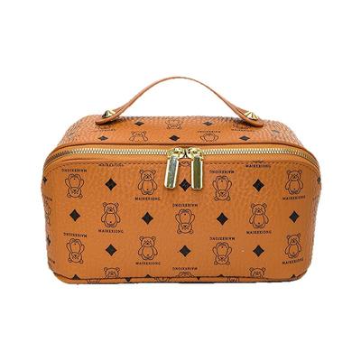 化妆包女2025新款高端便携式大容量旅行皮质洗漱化妆品分区收纳包