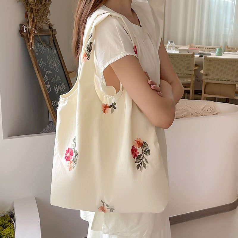 新品 慵懒风帆布包包新款法式刺绣单肩包女可朵手拎包大容量腋下