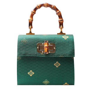 双姊妹原创绿色锁扣竹柄手提包女包可斜挎复古优雅2025新品国风礼