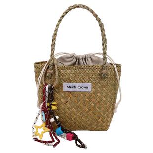 海边度假包包女式2025新款手工编织手拎包流行时尚百搭沙滩草编包