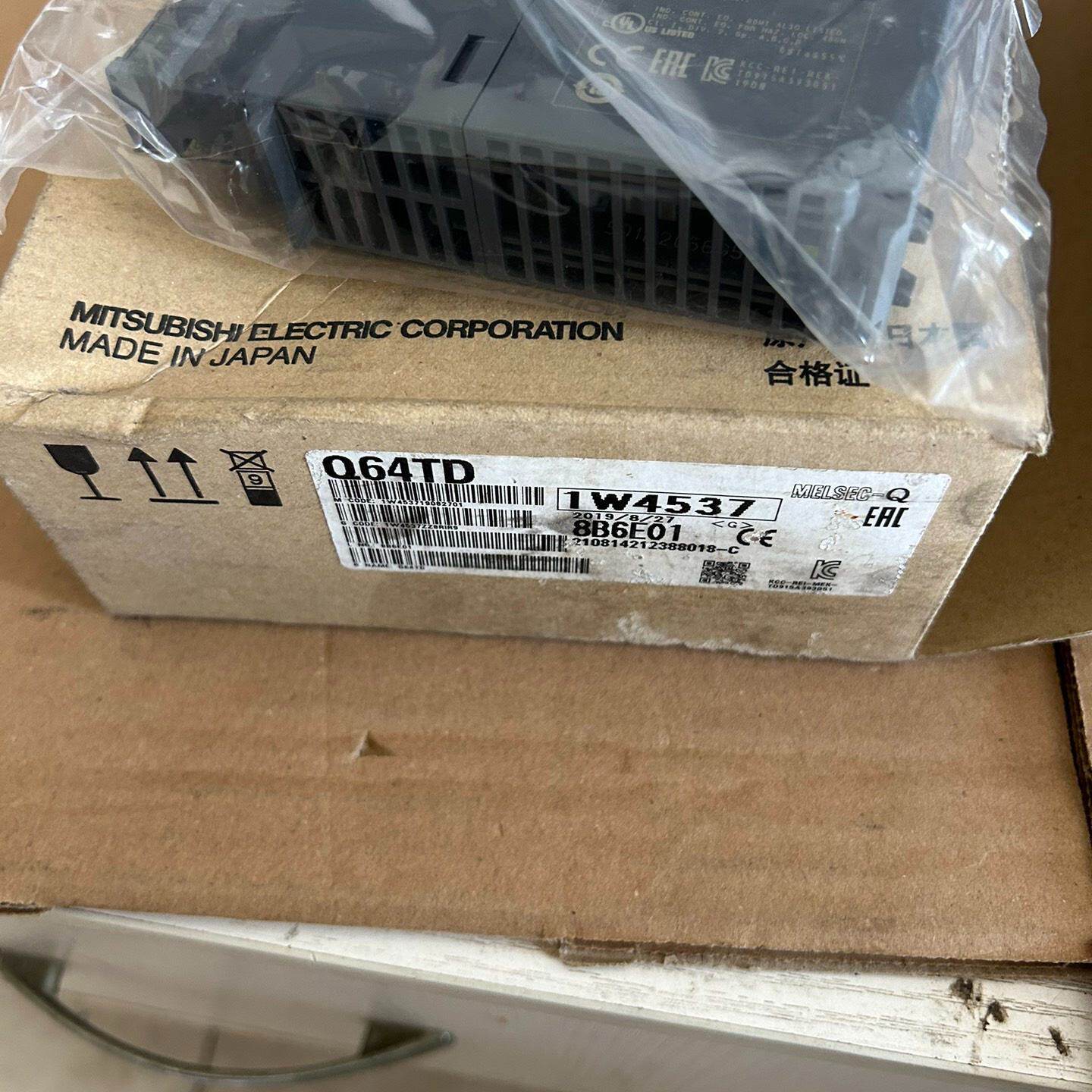 议价三菱Q64TD，全新未拆封，两码一致，有一个不是很好的外包装