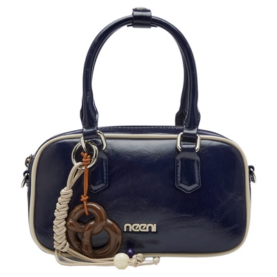 卓诗尼枕头包女复古小众手提包