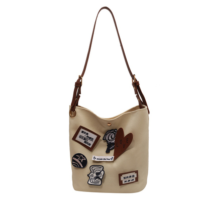 菇八八帆布包包女新款单肩水桶包