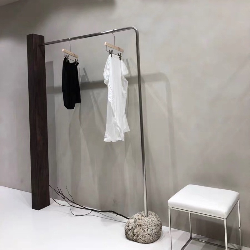 侧挂木头服装店展示架轻奢女装店货架石头底座子落地式不锈钢陈列
