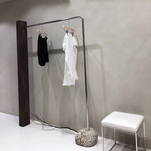 侧挂木头服装店展示架轻奢女装店货架石头底座子落地式不锈钢陈列